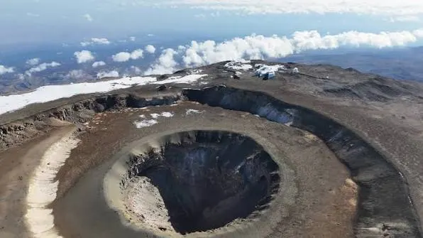 View of the inner Reusch Crater disappearing into the depths of Mount Kilimanjaro